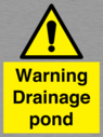 warning-drainage-pond~